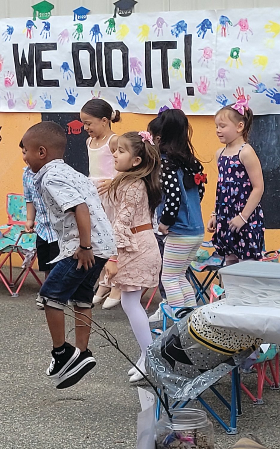 LITTLE DIPLOMAS: The Johnston State Pre-K classroom at Over the Rainbow Learning Center celebrated the end of the school year during a show for family and friends on June 17.
